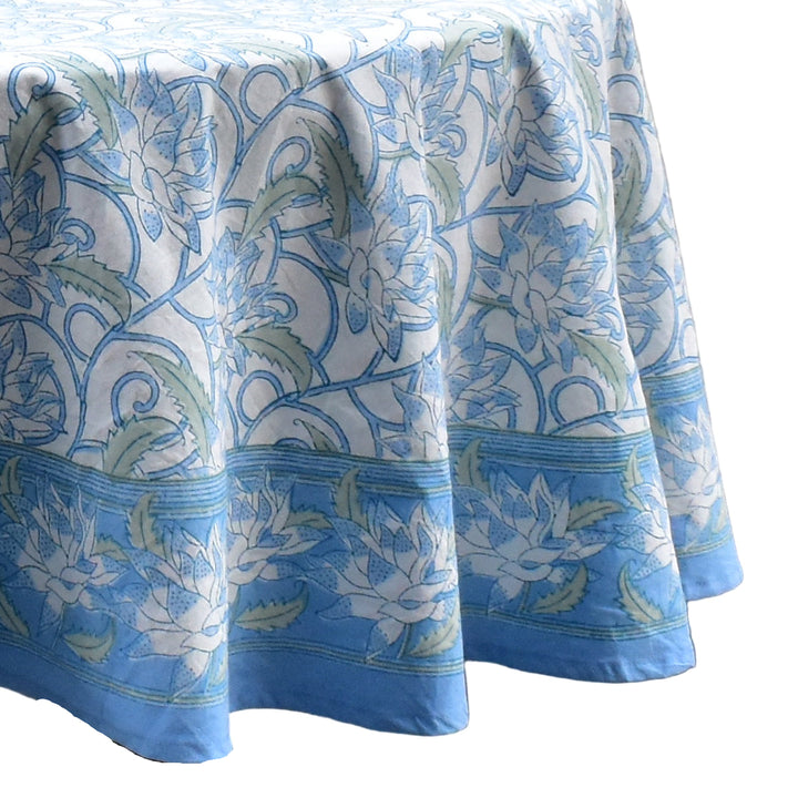 Blue and white floral patterned tablecloth on a white background