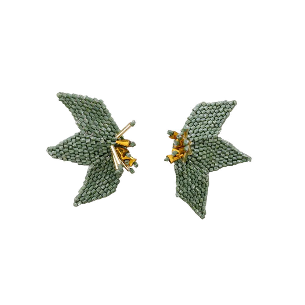 Pair of green beaded earrings on a light gray background