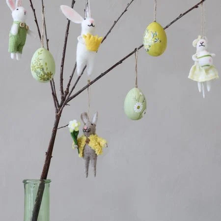 Yellow easter egg with hand painted flowers