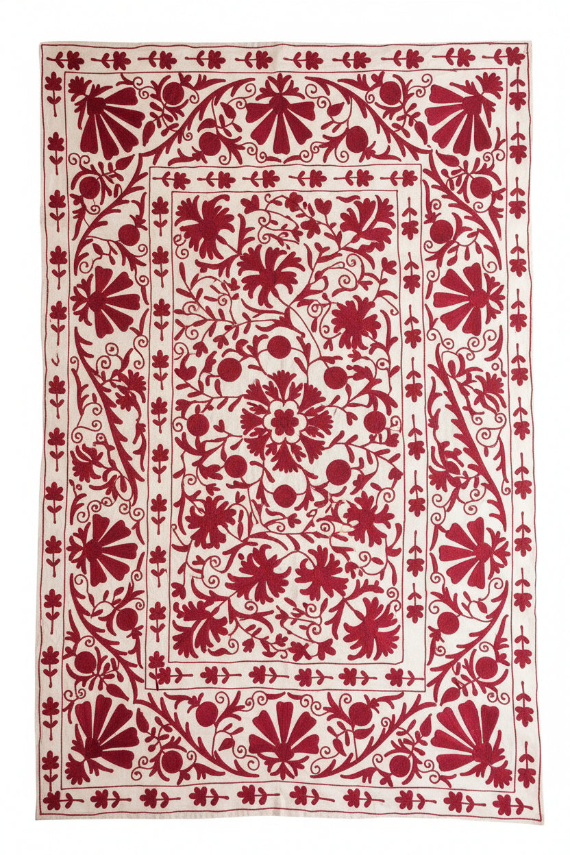 Red floral patterned fabric on a white background