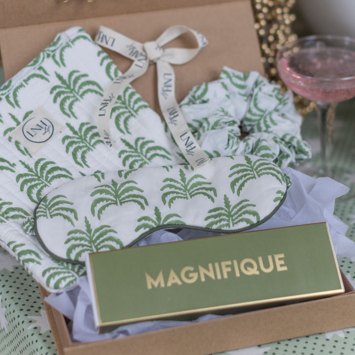 LNH Edit Green Palm Gift Box Set with pouch, scrunchie, and incense in open kraft box.