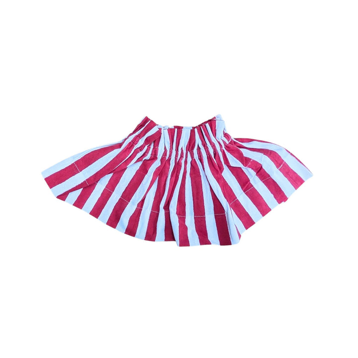 LNH Edit Holly Red Stripe Lampshade Cover in hand block-printed cotton, pleated design in red and white stripes, styled on bedside table.