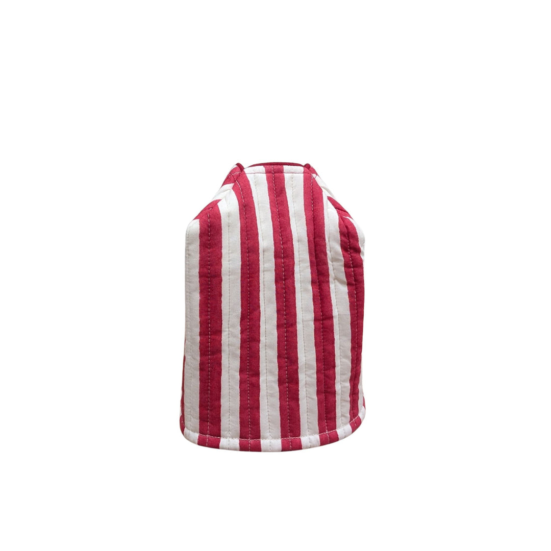 LNH Edit Holly Red Stripe Tissue Box Cover in hand block-printed cotton with quilted texture, styled on festive bathroom or bedside setting.