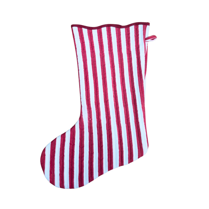 LNH Edit Holly Red Striped Quilted Stocking in hand block-printed cotton with hanging loop, styled on festive fireplace scene.