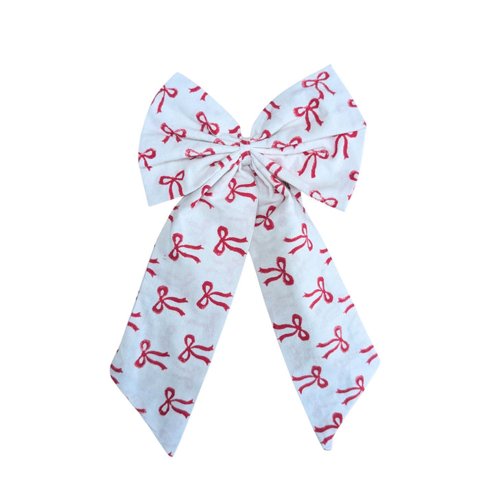 Red bow handmade cotton decoration with block-printed bow motif by LNH Edit.