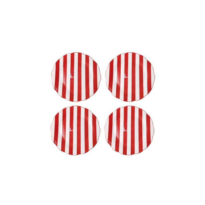 Set of four red and white striped porcelain dessert plates with scalloped edge, styled on festive LNH Edit Christmas table.