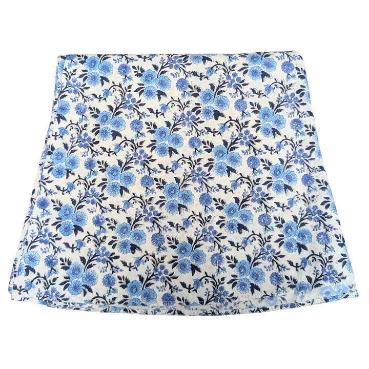 LNH Edit Thistle Blue Round Tablecloth, hand block-printed cotton tablecloth in blue chinoiserie floral pattern.