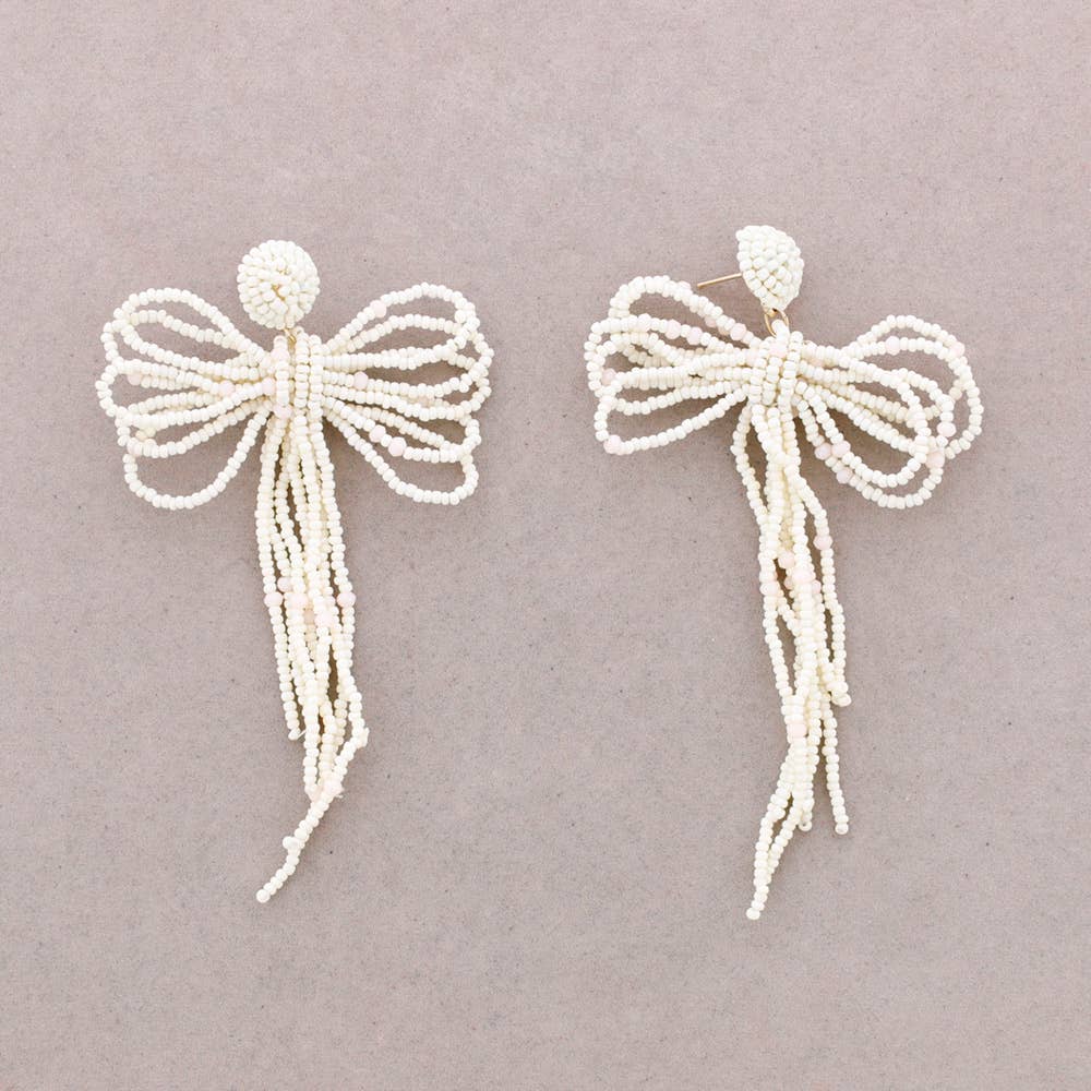 Dangling Bow Bead Earrings: White