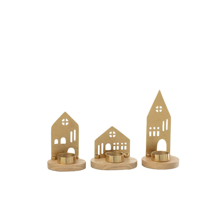 Set of three gold house tealight holders with wooden bases back view.