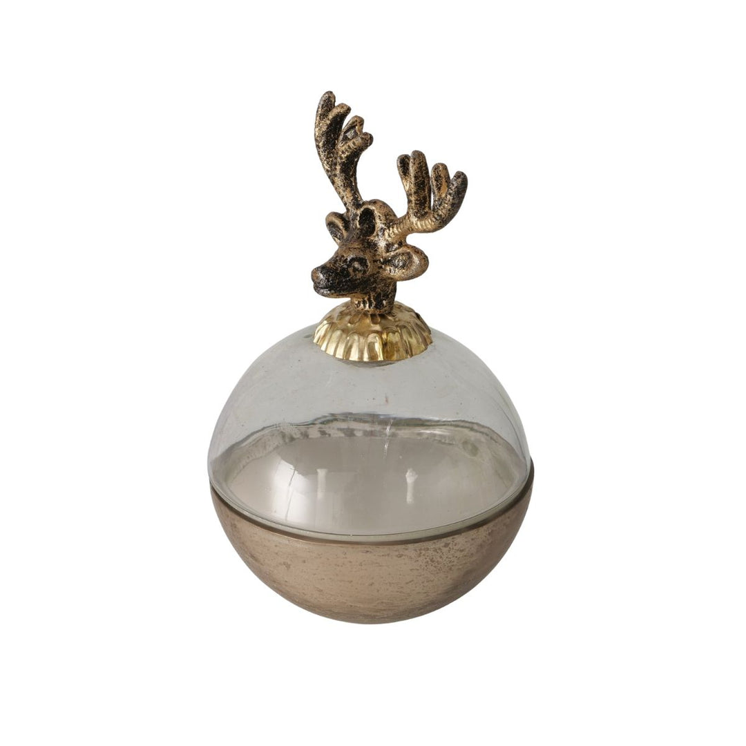 Gold reindeer candle pot with metallic glass base and sculptural reindeer lid, festive décor accent.
