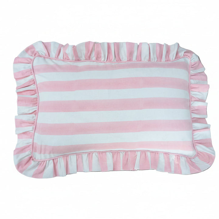 Pink and white striped pillow with ruffled edges on a white background