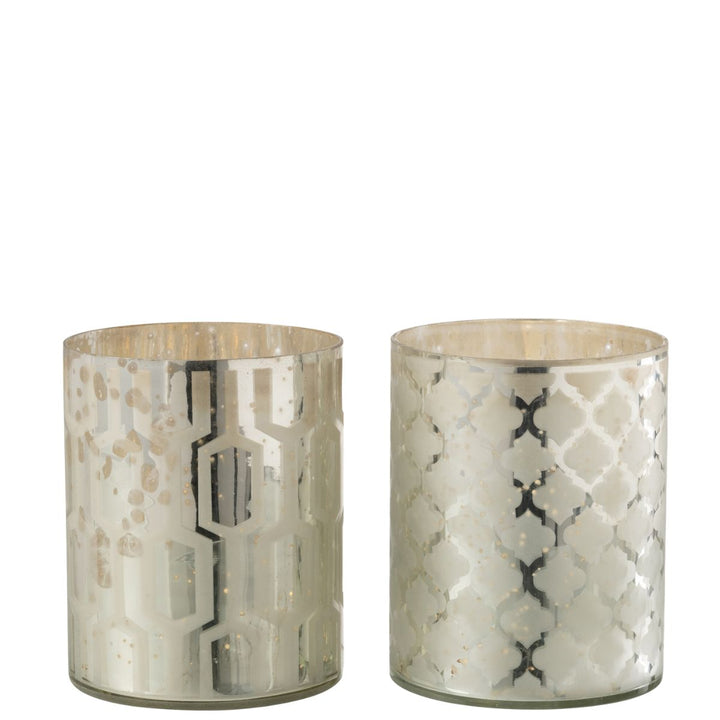 Set of two silver patterned glass hurricane candle holders with geometric and lattice designs.