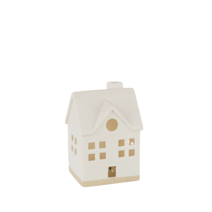 White ceramic LED house with windows and natural base, warm festive décor accent.